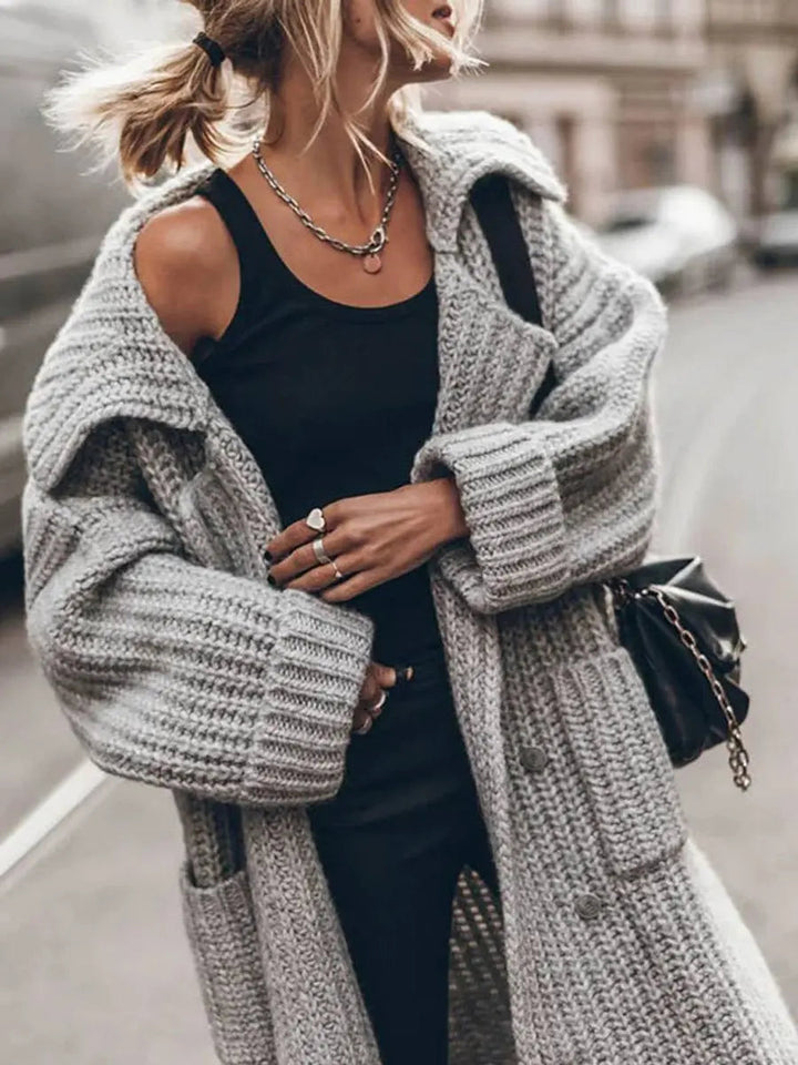 Elegant oversized lapel cardigan for women. A versatile longline outerwear piece for any layering look.