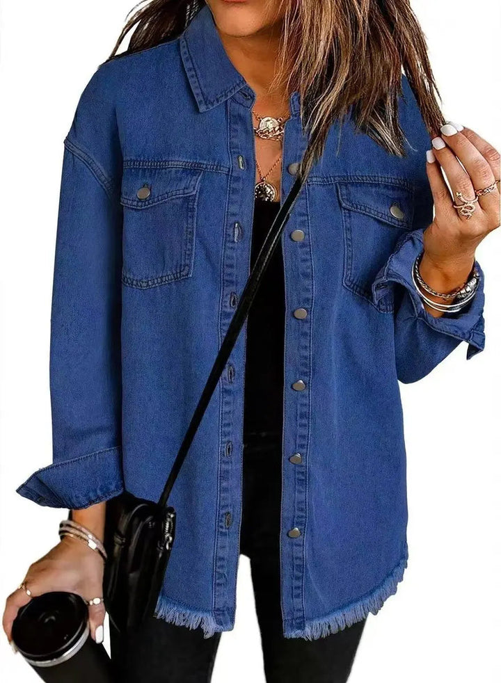 Close-up of a women's oversized longline jacket showcasing trendy raw hem detail and snap button closure.