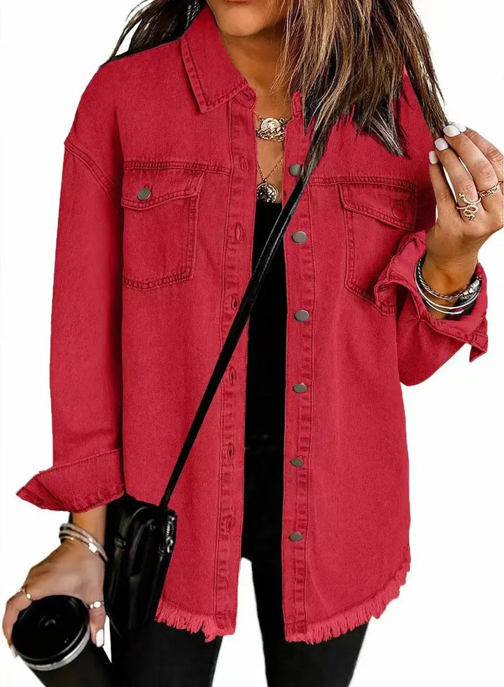 Chic women's oversized longline jacket, featuring a modern raw hem and secure snap button fastening.