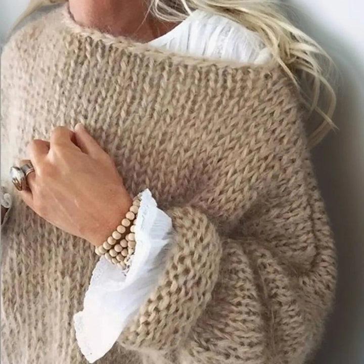 Effortless women's oversized knit sweater with a cozy mohair blend, great for casual everyday winter style.