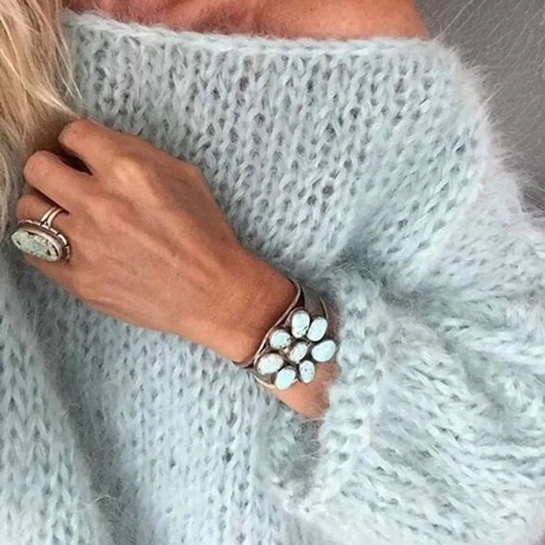 Comfortable women's mohair blend oversized knit sweater, a versatile layering piece for cozy winter fashion.