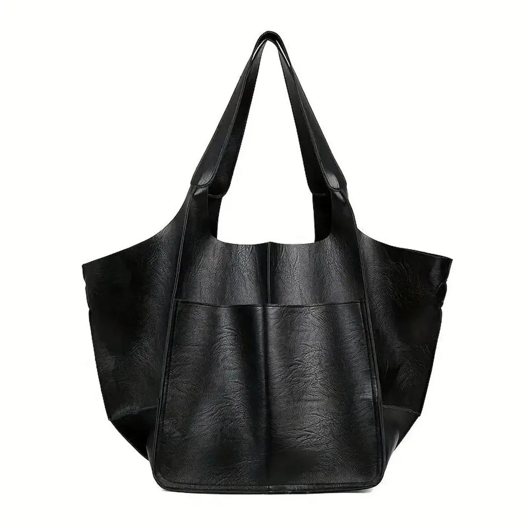Women's large capacity work tote in vegan leather, elegant design, shoulder carry.