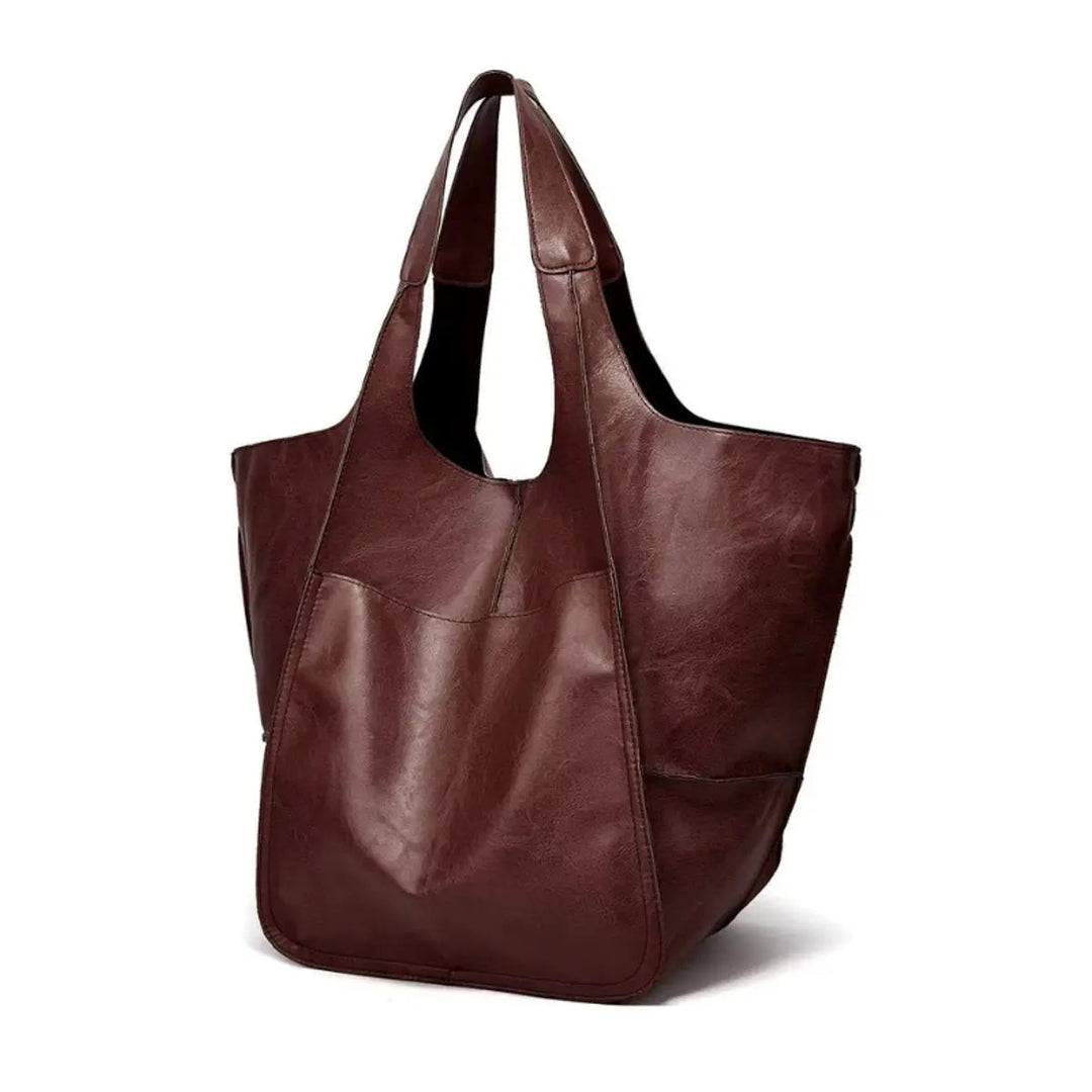 Elegant women's vegan leather tote, magnetic closure, perfect for business.