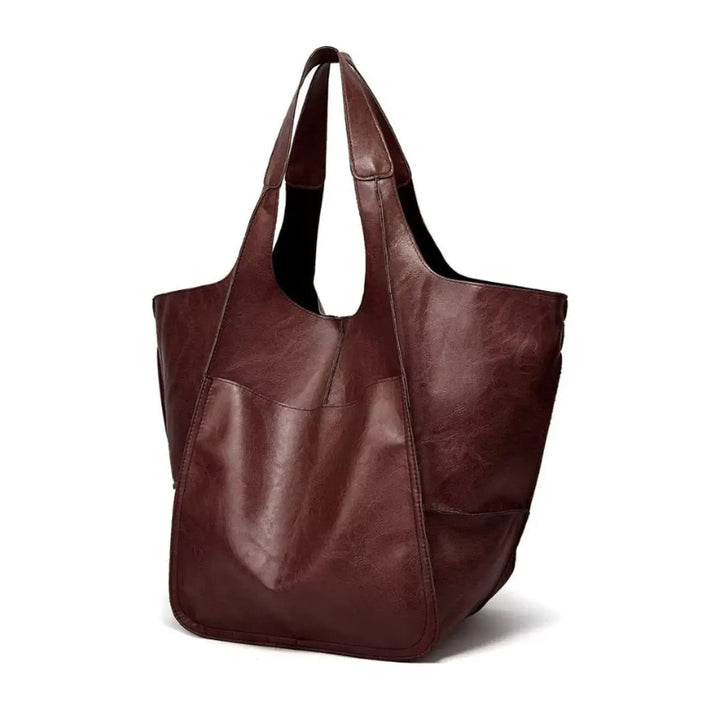 Elegant women's vegan leather tote, magnetic closure, perfect for business.