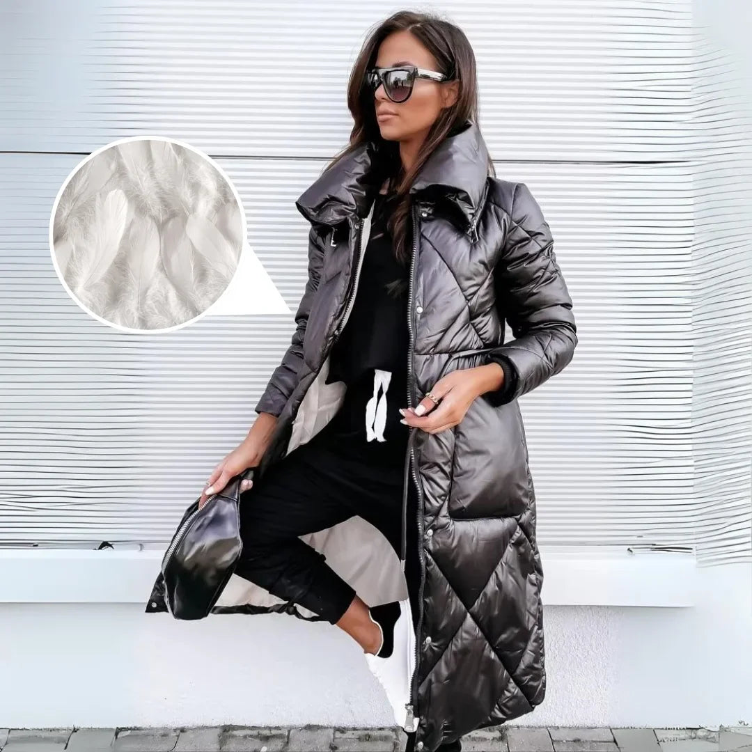 Elegant women's long quilted puffer coat. Padded for ultimate warmth & comfort in winter.