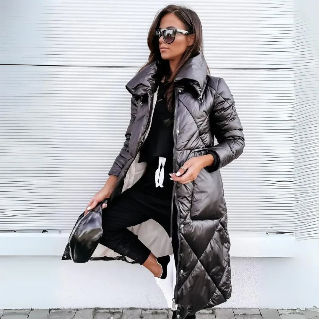 Women's long padded puffer coat, quilted for warmth & elegant winter fashion. Perfect for cold weather.