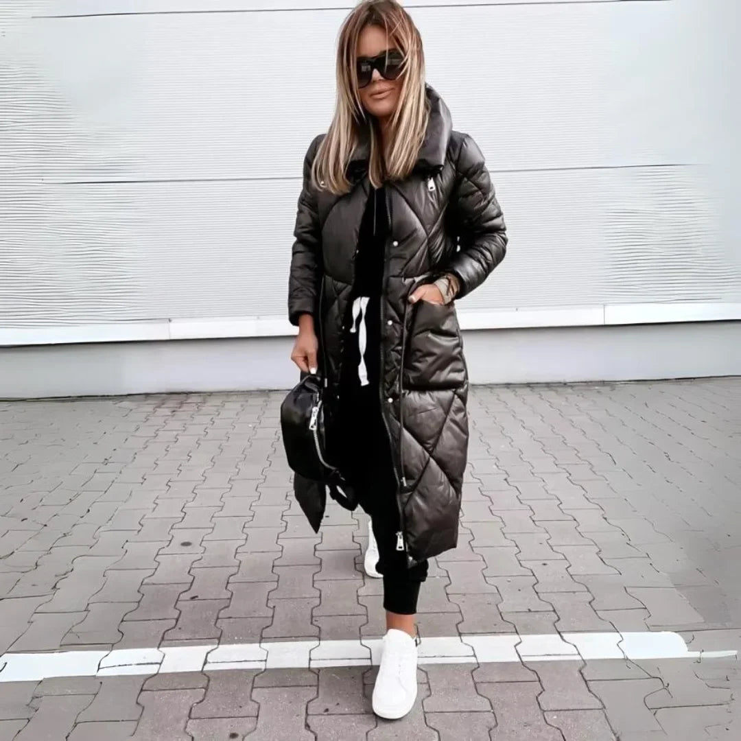 Women's long padded quilted puffer coat, warm and chic for cold weather. Essential winter outerwear.
