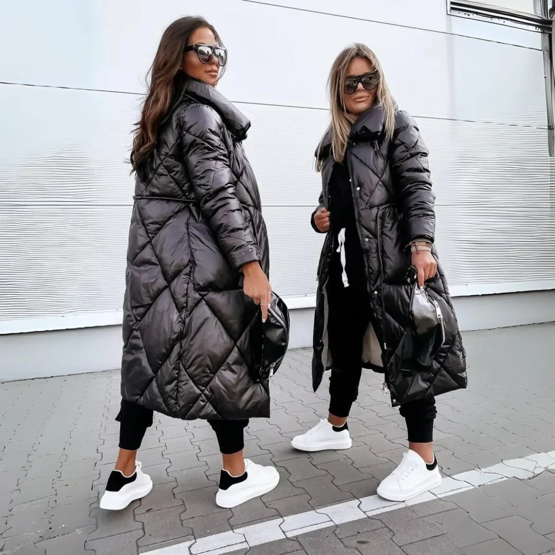 Warm women's long puffer trench coat, padded & quilted. Ideal elegant jacket for winter fashion.
