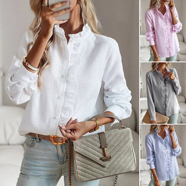 Fashionable pale blue textured striped women's blouse. Ruffled stand-collar, long sleeve, workwear.