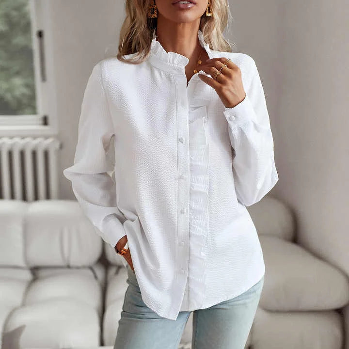 Versatile pale blue textured striped blouse; elegant for work or casual long sleeve fashion top.