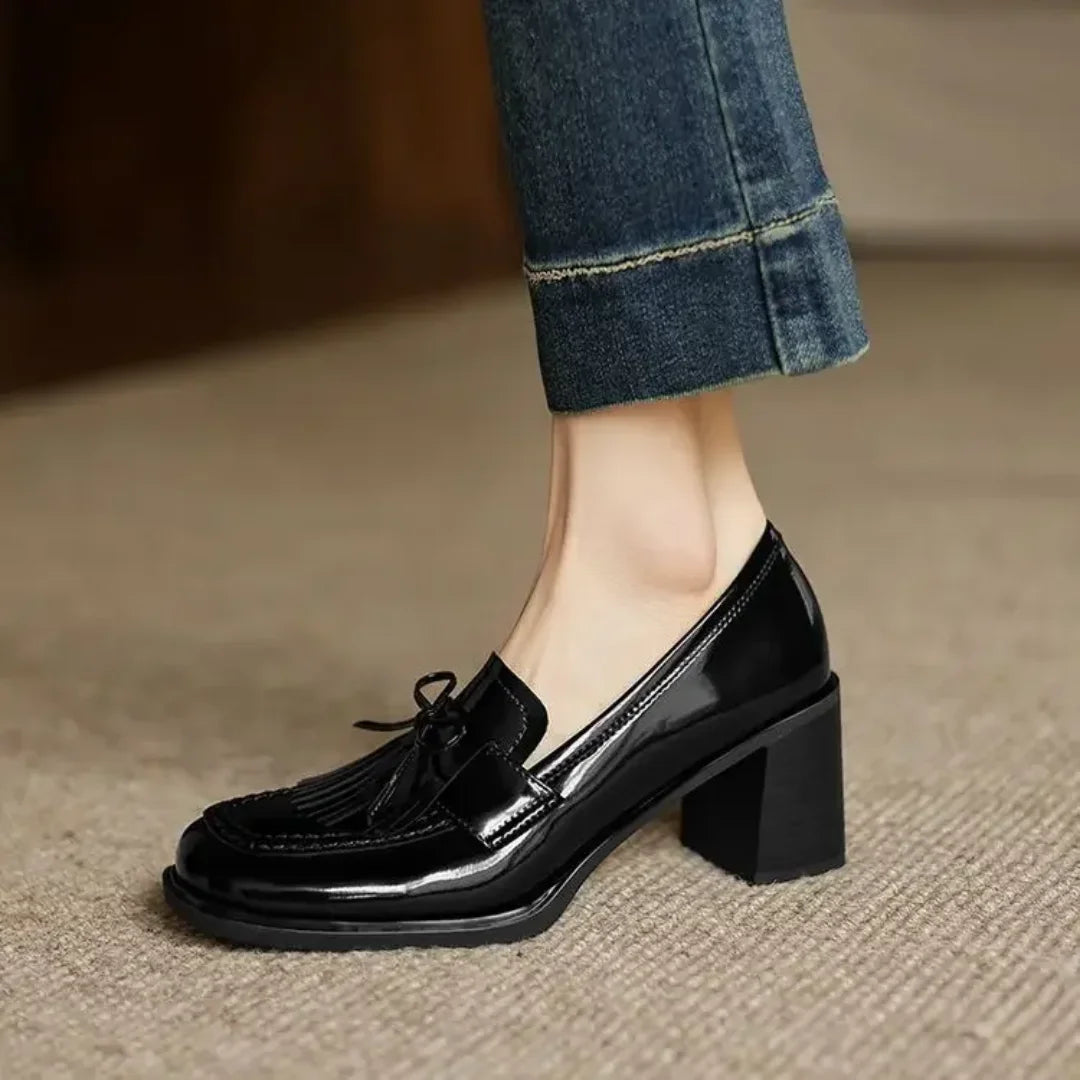 Brown women's tassel loafer pumps with block heel. Classic round toe for office & professional comfortable heels.