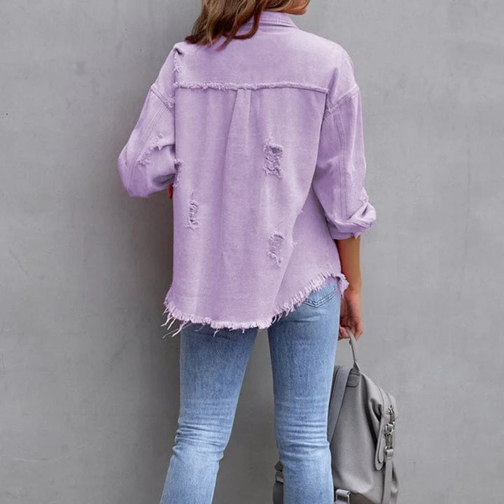 Trendy women's pink distressed jacket. Denim outerwear with frayed hem & button-front for casual style.