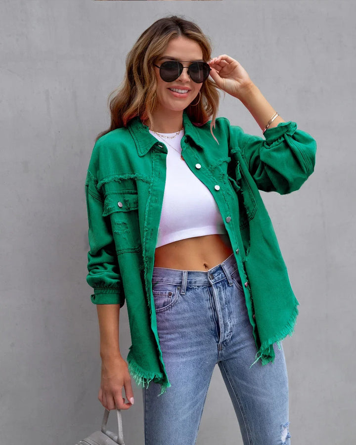 Fashionable women's pink denim jacket, distressed with a frayed hem & button-front. Ideal for casual wear.