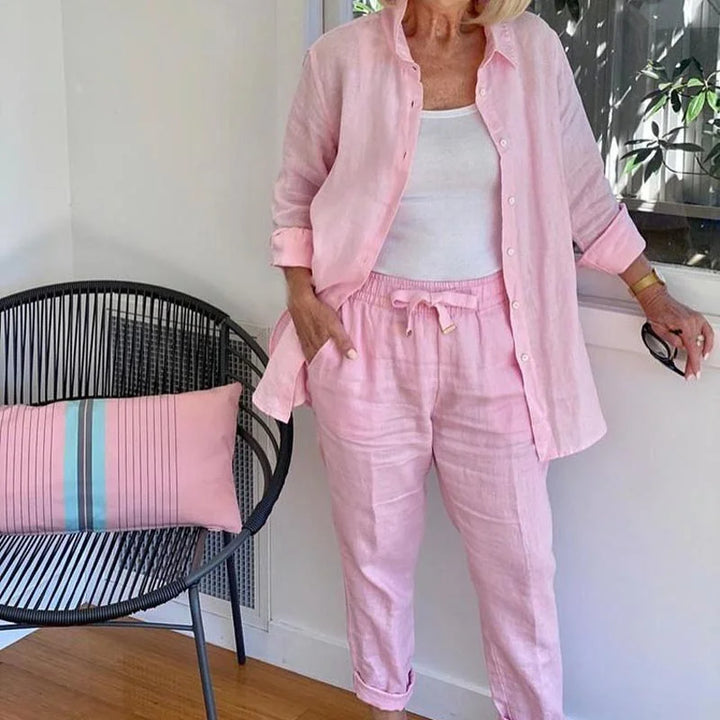 Pink denim two-piece casual set for women, featuring a stylish jacket and comfortable drawstring pants.