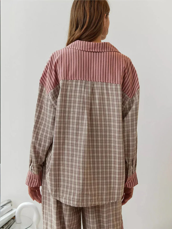 "Women's pink pajama set with elegant details, luxurious softness, and a relaxed fit, perfect for sleep and lounge."