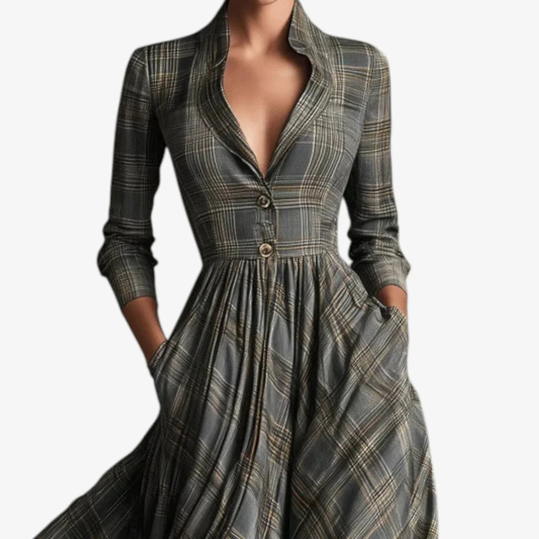 Comfortable women's plaid maxi dress. Features a collared v-neck, 3/4 sleeves & button front for versatile style.