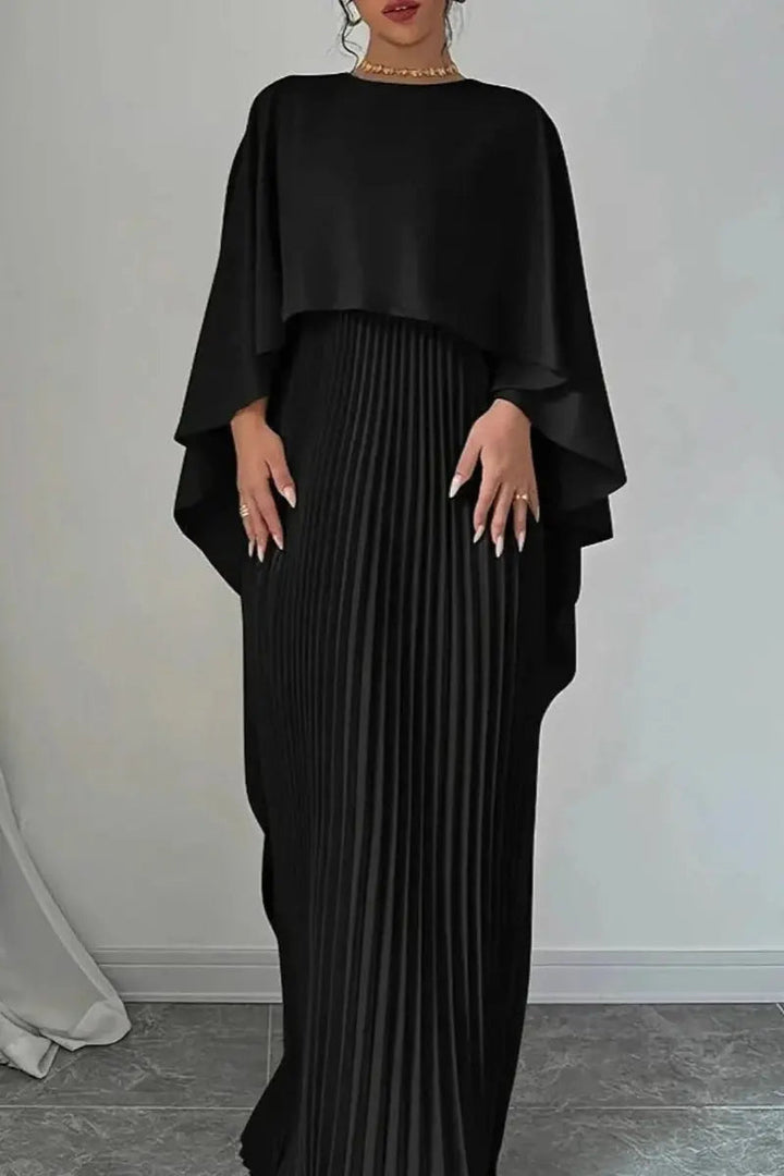 Women's sophisticated pleated maxi evening gown featuring a stylish cape. Perfect formal dress for special events.