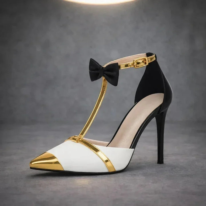 Elegant women's evening heels: pointed-toe T-strap stilettos with a pretty bow, perfect for parties.