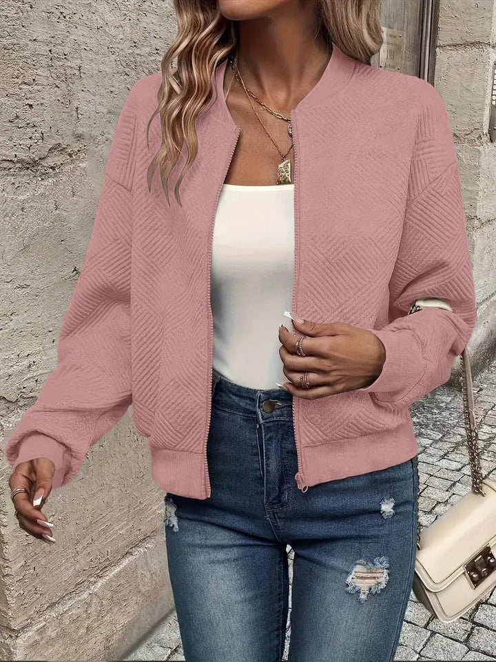 Zip-up women's quilted bomber jacket, cropped & textured. Perfect casual outerwear for cool autumn & winter days.