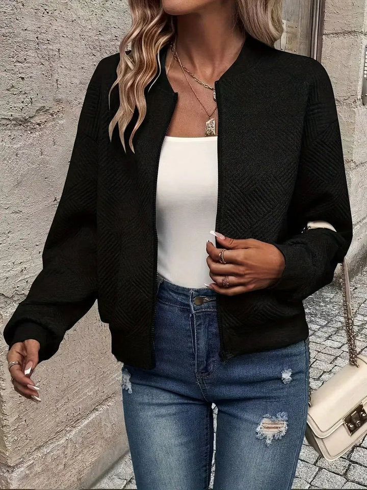 Women's casual cropped quilted bomber jacket, zip-up design. Versatile textured outerwear for everyday autumn & winter style.