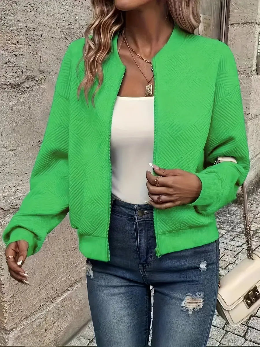 Cozy textured quilted bomber jacket for women, cropped fit. A warm zip-up layering piece for casual autumn & winter style.