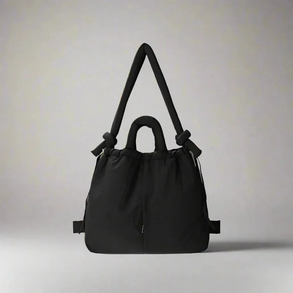 Stylish women's carryall: quilted puffer tote bag featuring a comfortable knot strap.