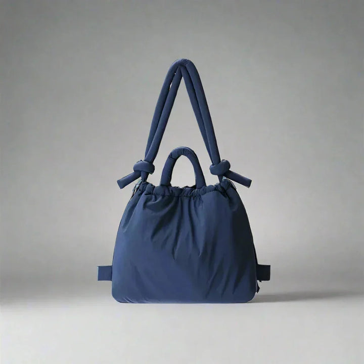 Fashionable women's tote bag with soft quilted puffer texture & comfortable knot shoulder strap.
