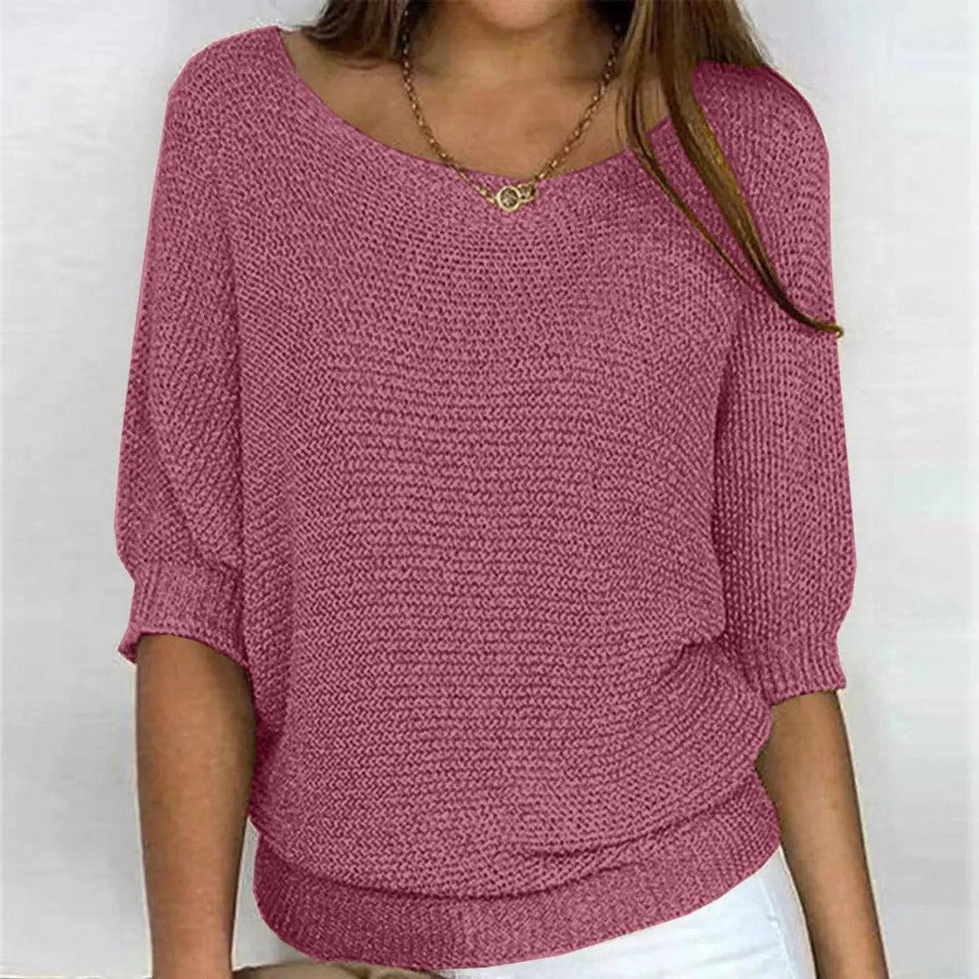 Chic women's relaxed-fit batwing-sleeve top, a versatile sweater perfect for comfortable autumn wear.