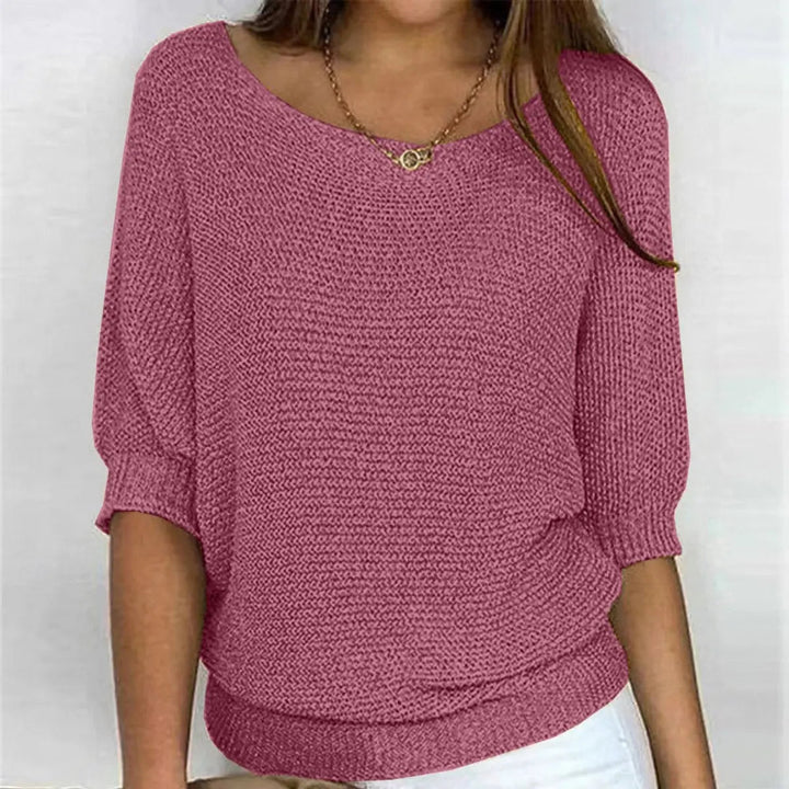 Chic women's relaxed-fit batwing-sleeve top, a versatile sweater perfect for comfortable autumn wear.