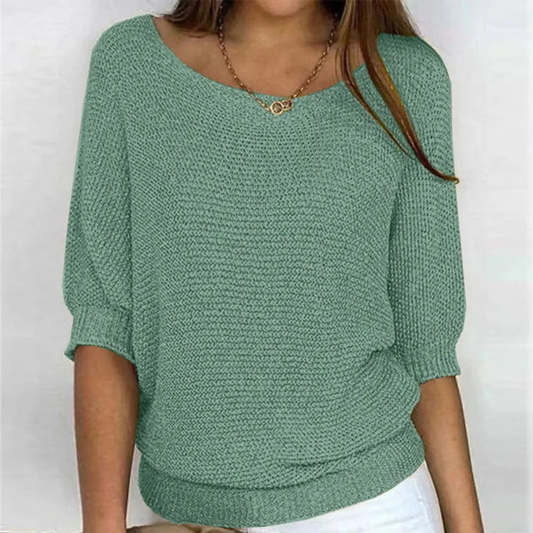 Chic women's batwing-sleeve sweater in a relaxed fit, perfect for autumn wear and casual comfort.