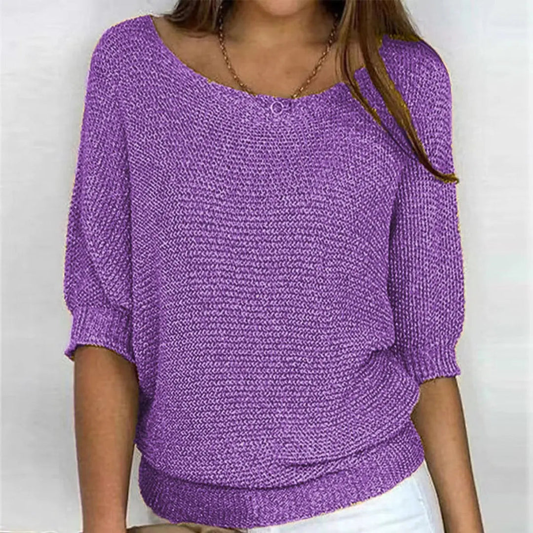 Women's casual batwing-sleeve sweater, a versatile and comfortable relaxed-fit top with a scoop neck.
