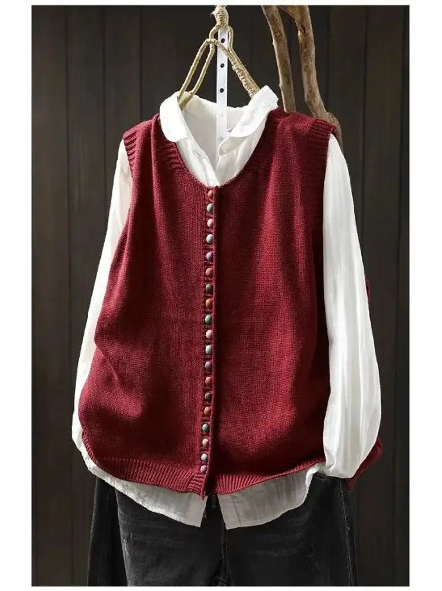 Casual women's knitted sleeveless vest with a round neck and multicolor button-up front.