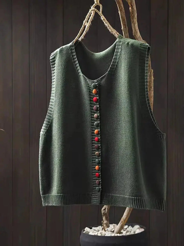 Comfortable women's relaxed-fit knit vest, a stylish sleeveless layering piece for daily wear.