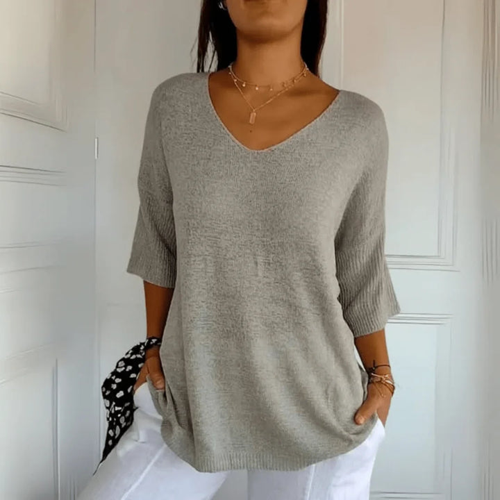Effortless women's relaxed fit V-neck 3/4-sleeve top. Great for spring and summer casual outfits.