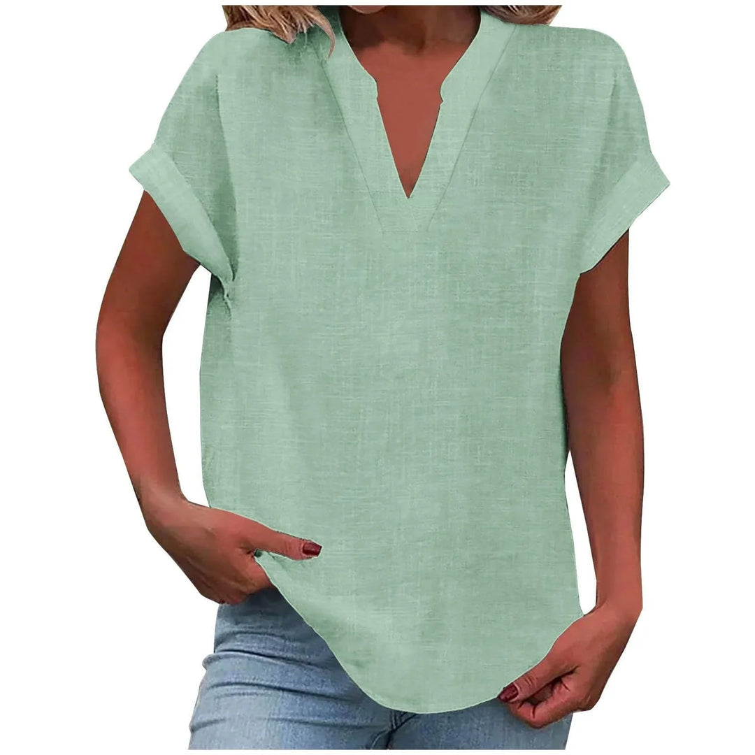 Lightweight summer V-neck blouse for women, featuring cuffed sleeves and a comfortable, relaxed fit.