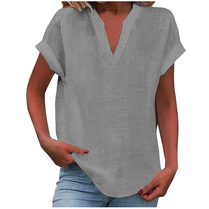 Versatile women's blouse, great for smart casual or everyday wear, with a flattering V-neck & cuffed sleeves.