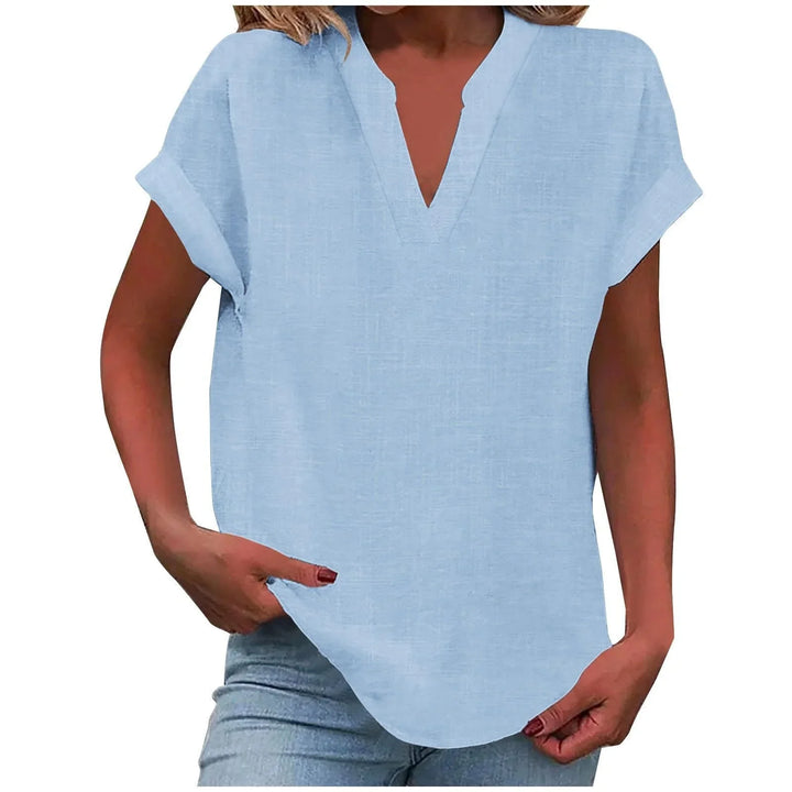 Relaxed fit women's blouse with chic cuffed sleeves and a flattering V-neck, versatile for daily wear.