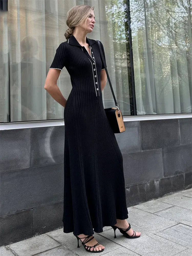 "Women's ribbed knit maxi dress with collared V-neck, button details, and flowing silhouette in versatile colors."