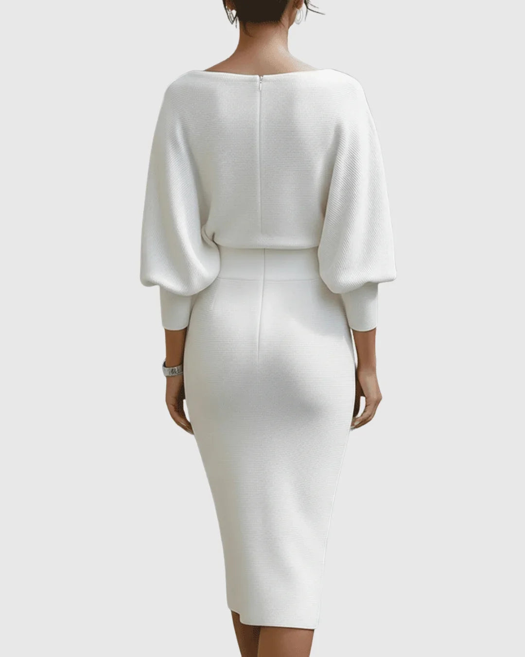 Women's long-sleeve ribbed midi dress. Features a flattering cowl neck & elegant batwing sleeves for fall.