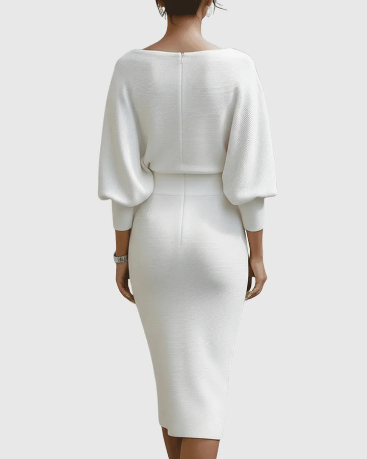 Women's long-sleeve ribbed midi dress. Features a flattering cowl neck & elegant batwing sleeves for fall.