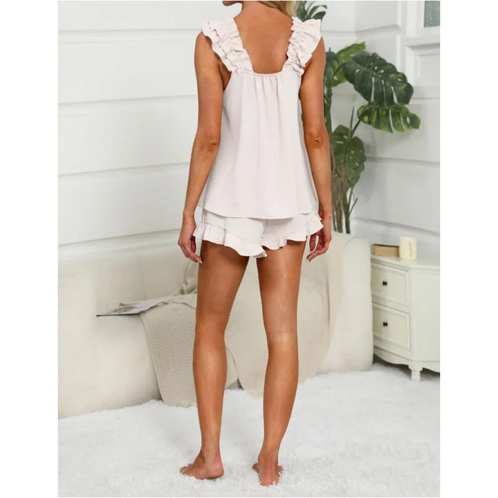 Soft women's two-piece casual lounge set with a sleeveless top & comfy drawstring shorts.