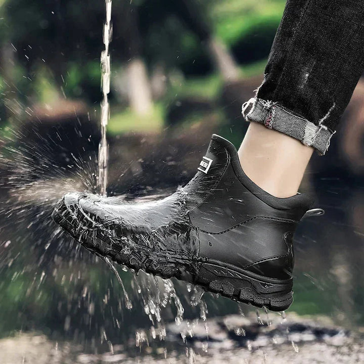 Rugged women's waterproof ankle boots, designed for wet weather. Slip-resistant lug sole for safety.