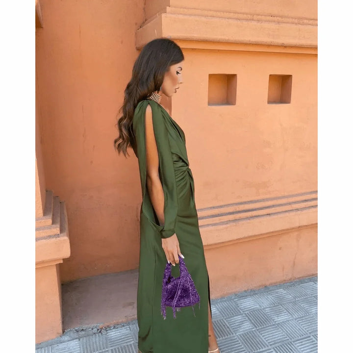 Formal women's maxi party dress with a unique one-shoulder long sleeve, twisted detail, and elegant high slit.