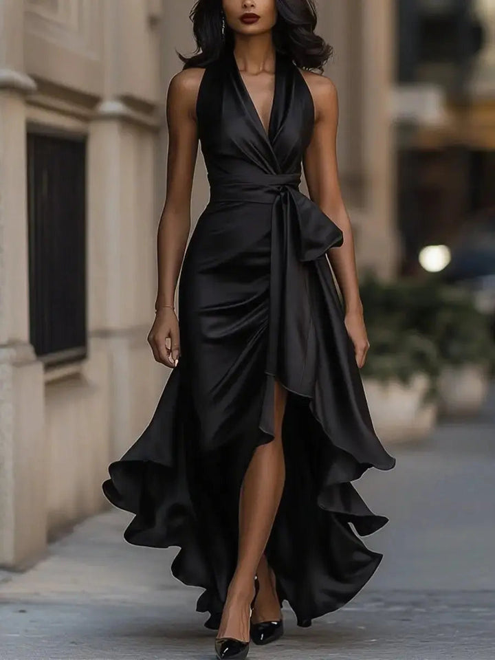 Exquisite women's halter high-low dress, satin finish with a sophisticated bow waist, ideal for any gala.