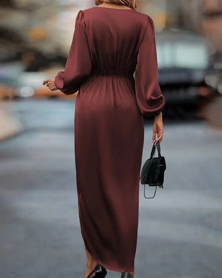 Sophisticated women's V-neck wrap midi dress in burgundy. Long-sleeve draped design, ideal for occasion wear.