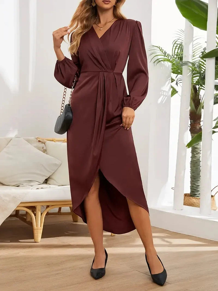 Burgundy elegant women's wrap midi dress. Features a flattering V-neck, long sleeves & draped silhouette for comfort.