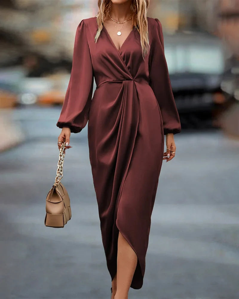 Elegant women's burgundy wrap midi dress with V-neck, long sleeves & draped detail. Perfect for work or parties.