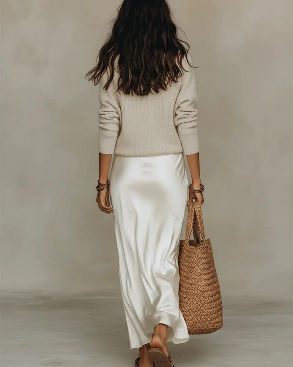Elegant women's two-piece midi dress & jumper set. Satin V-neck slip dress paired with long sleeves for versatile wear.