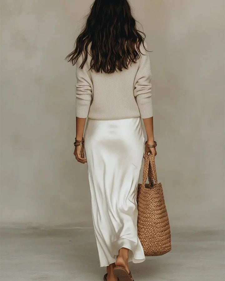 Elegant women's two-piece midi dress & jumper set. Satin V-neck slip dress paired with long sleeves for versatile wear.