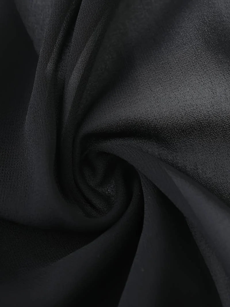 Trendy women's sheer blouse featuring a tie-front and stylish 3/4 sleeves for spring fashion.